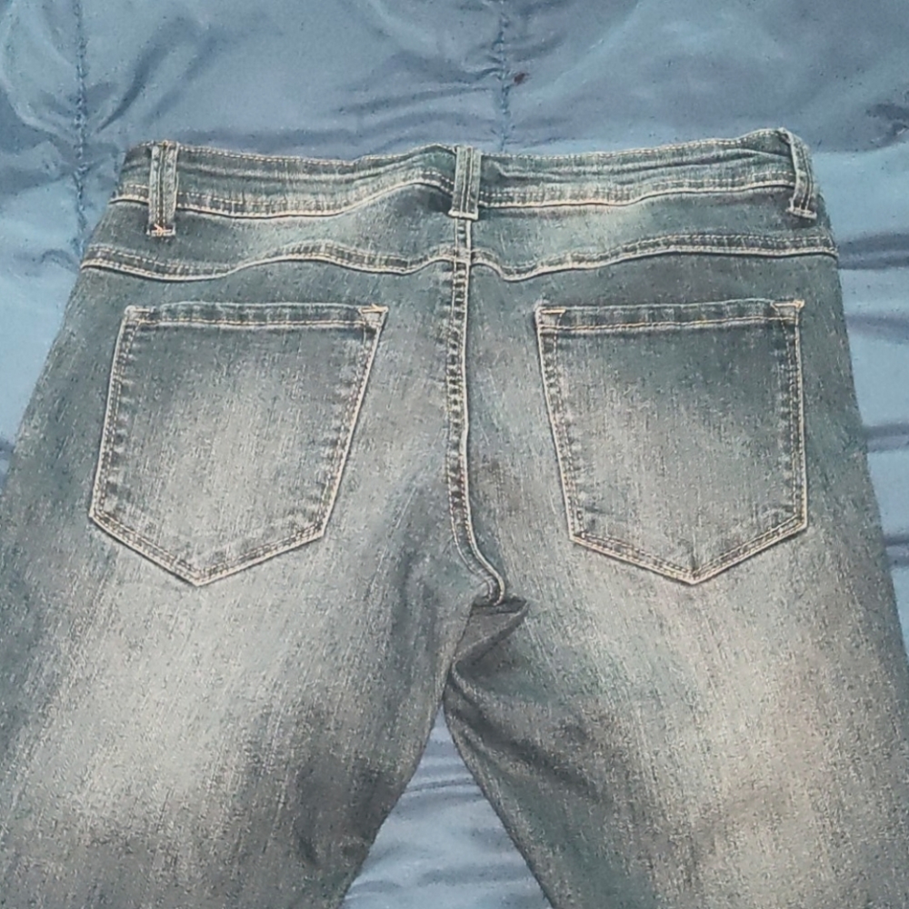 2 pair of blue jeans one is longer Capri pants